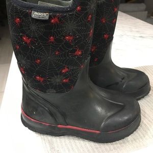 Boys red and black spider Bogs winter boots.